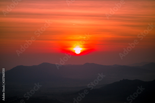The sun is rising from the mountains, fresh morning. Colorful and memorable
