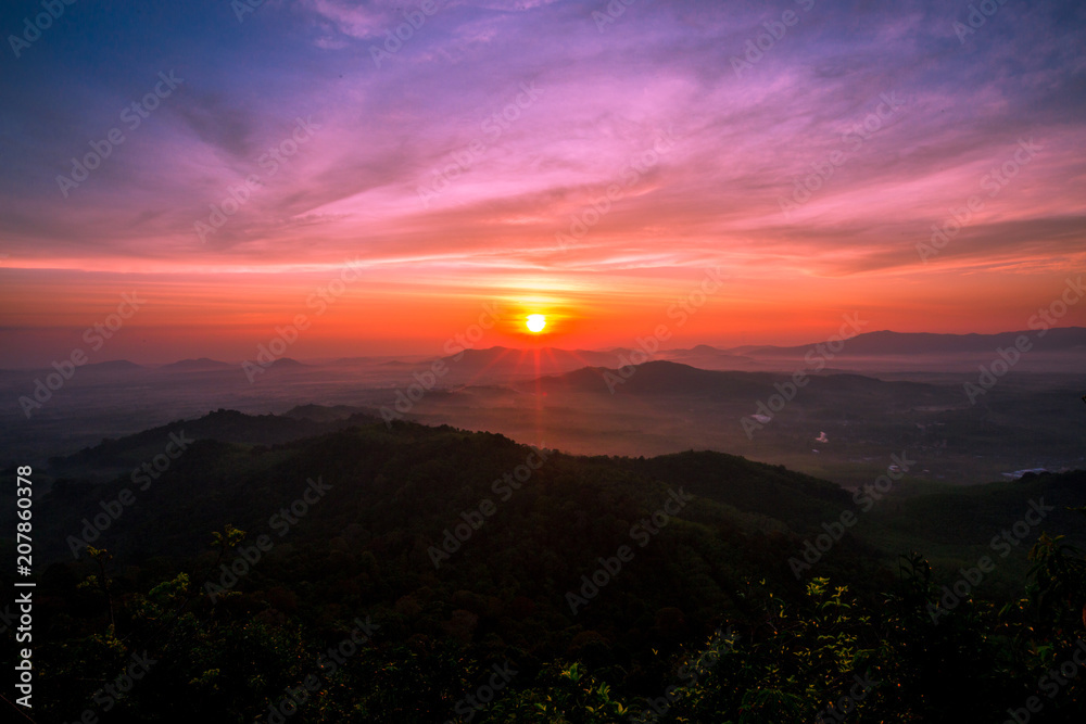 The sun is rising from the mountains, fresh morning. Colorful and memorable