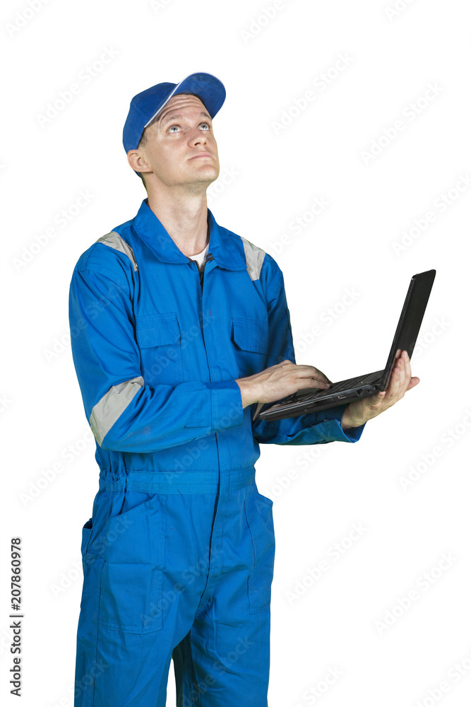 Young male mechanic thinking something on studio Young male mechanic thinking something on studio
