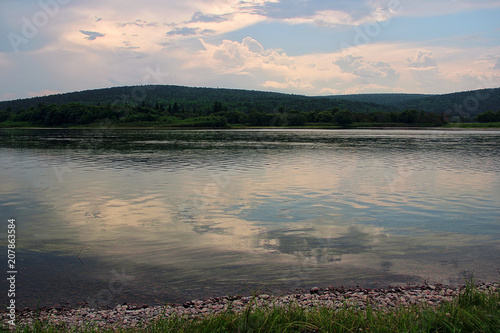 Panoramic views of sunset on river in taiga  Siberia.