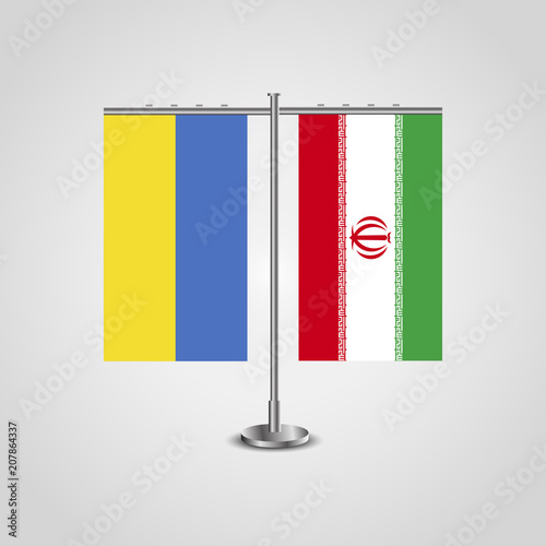 Table stand with flags of Ukraine and Iran.Two flag. Flag pole. Symbolizing the cooperation between the two countries. Table flags