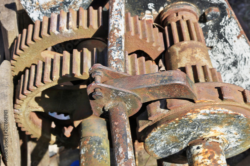 Rusted gears and pieces of iron from vintage mechanics