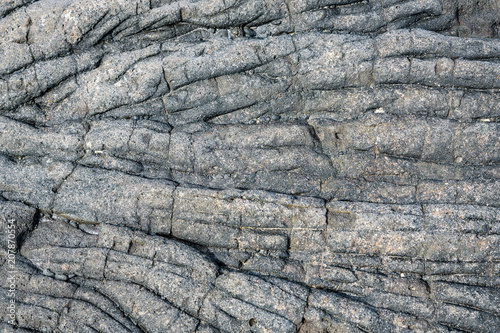 Ancient lava flow rock as a nature background, with texture and pattern, Hawaii 