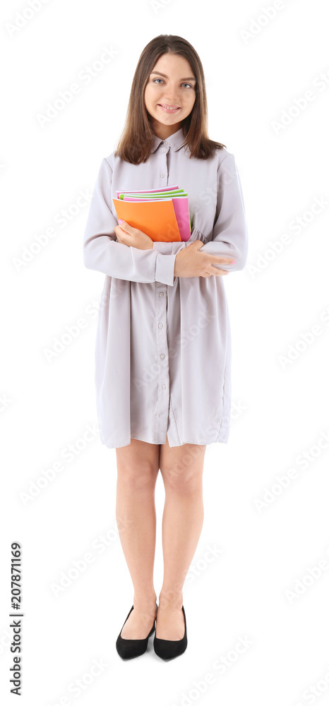 Female teacher with notebooks on white background Female teacher with notebooks on white background