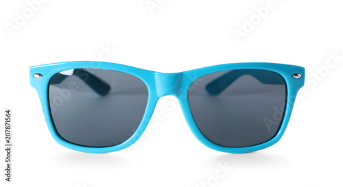 Beautiful sunglasses on white background. Beach object