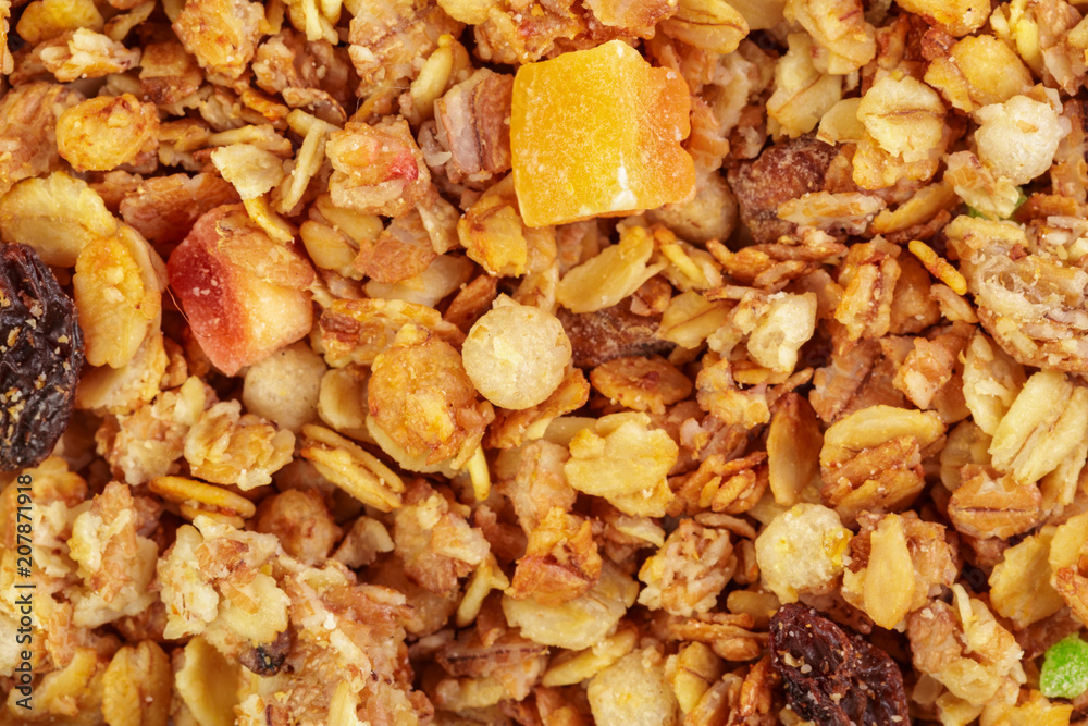Homemade roasted granola on baking sheet breakfast food background Homemade roasted granola on baking sheet breakfast food background