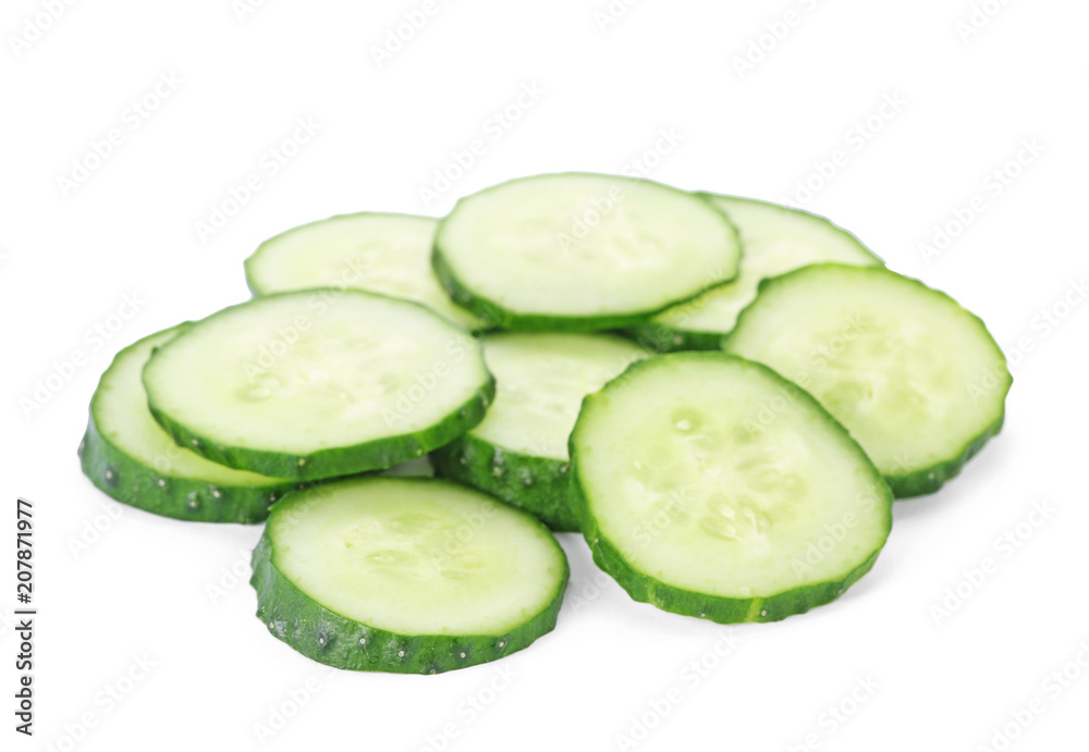 Slices of fresh cucumber on white background