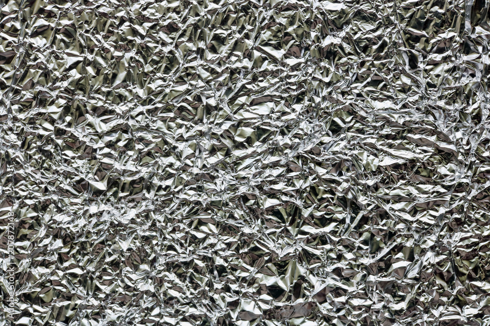 Texture of crumpled aluminum foil sheet Texture of crumpled aluminum foil sheet