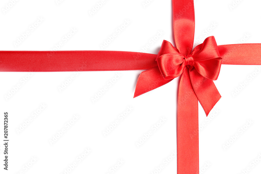 Red ribbons with bow on white background, top view Red ribbons with bow on white background, top view