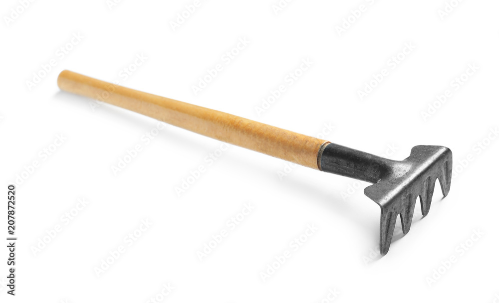 New rake on white background. Professional gardening tool New rake on white background. Professional gardening tool