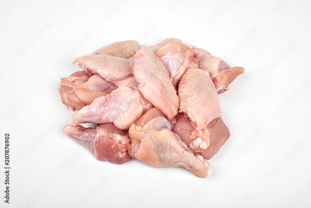 Raw chicken wings isolated on white background