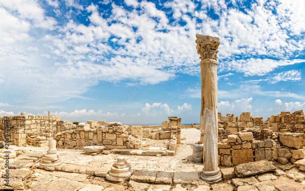 Columns and ruins of ancient Kourion with clouds and blue sky, Episcopi, Cyprus