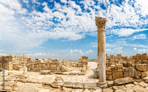 Columns and ruins of ancient Kourion with clouds and blue sky, Episcopi, Cyprus photo
