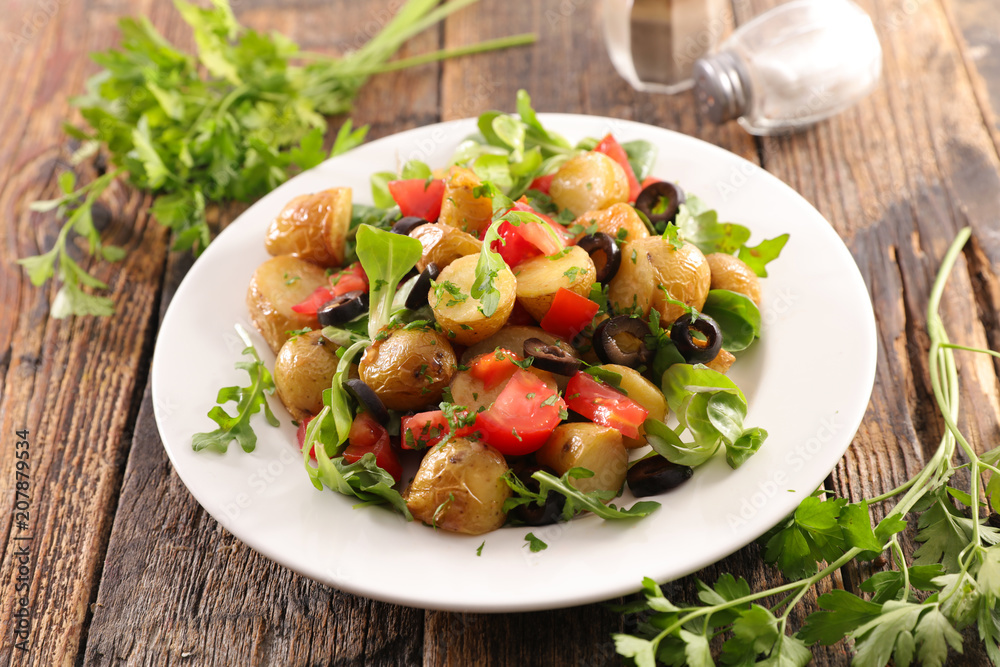 vegetable salad with potato, tomato and olive