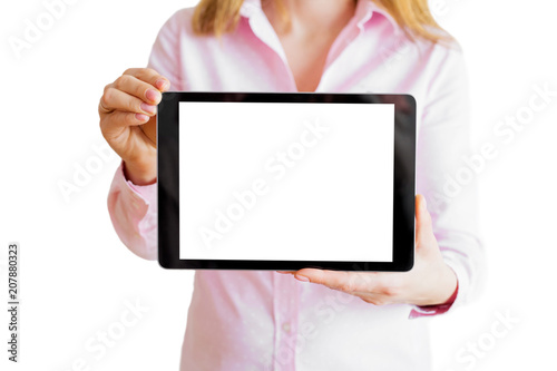 Woman showing tablet with empty screen. photo