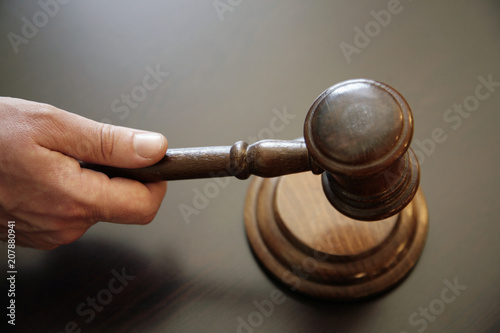 wooden gavel in a hand