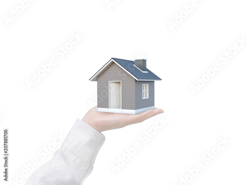 Simple house in human hand isolated on white background with clipping path. Image idea of real estate and property concept. House 3D render.