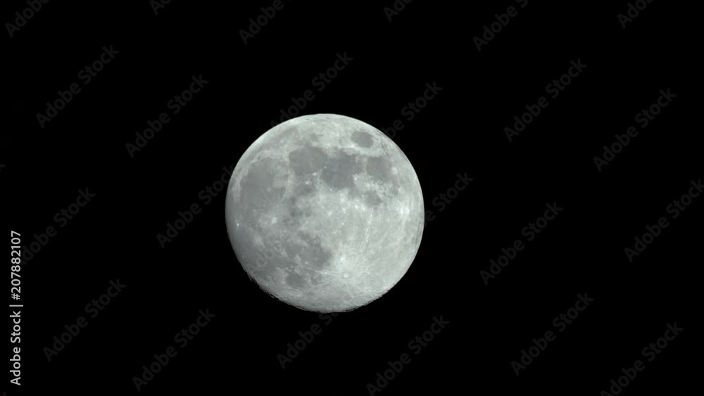 Time-lapse of a full moon moving across the night sky. Shot on a Blackmagic Ursa Mini Pro 4.6k with a Sigma 150-600mm f/5-6.3. Time-lapse of a full moon moving across the night sky. Shot on a Blackmagic Ursa Mini Pro 4.6k with a Sigma 150-600mm f/5-6.3.