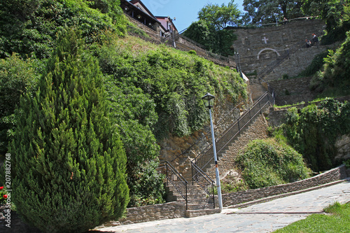 Medieval buildings in Monastery Saint Joachim of Osogovo, Kriva Palanka, Republic of Macedonia. Part of orthodox Osogovo monastery of St. Joachim. Monastery tourist complex with hotel part.  photo