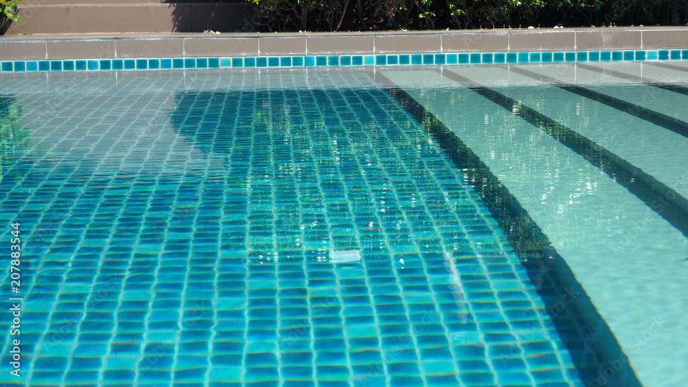 swimming pool water with Pool ladder step