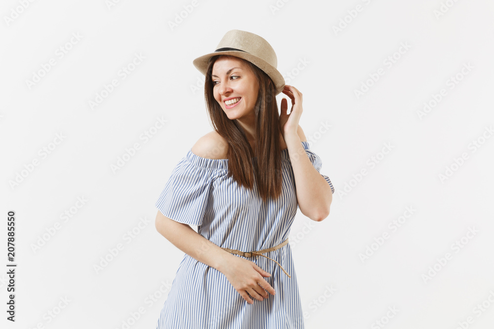 Young tender elegant charming woman dressed blue dress, cute hat with long brunette hair posing isolated on white background. People, sincere emotions, lifestyle concept. Advertising area. Copy space. Young tender elegant charming woman dressed blue dress, cute hat with long brunette hair posing isolated on white background. People, sincere emotions, lifestyle concept. Advertising area. Copy space.