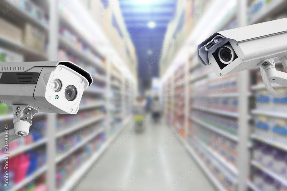CCTV Security camera shopping department store on background. CCTV Security camera shopping department store on background.