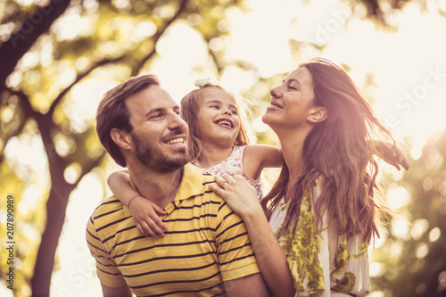 Time for family. Happy family at nature. Spring season.