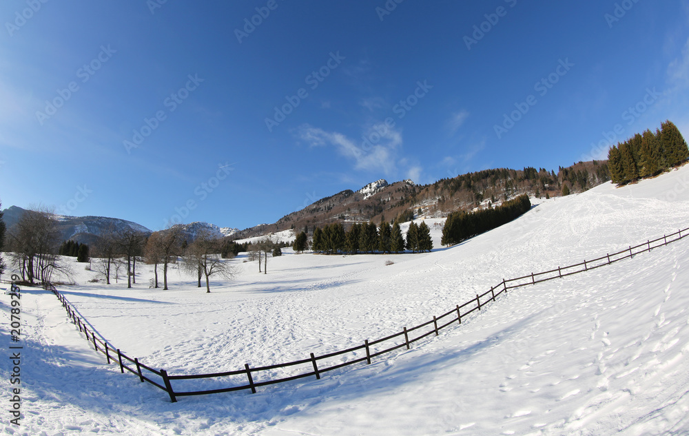 panorama of mountains with snow in winter photographed with a fi