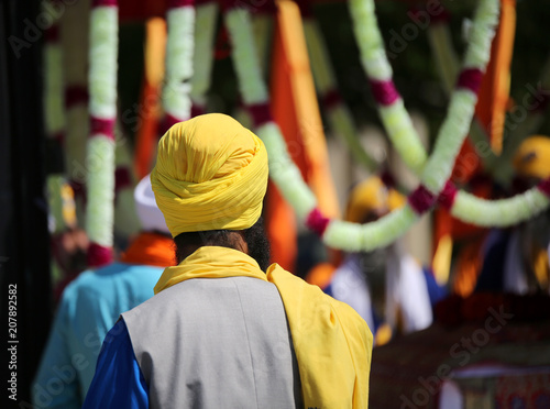 sikh man with turban during the religious rite called Nagar Kirt