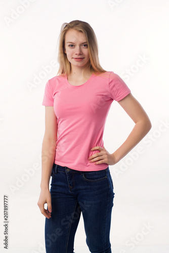 woman white background pink t-shirt jeans