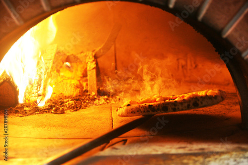 Neapolitan pizza in a wood stove