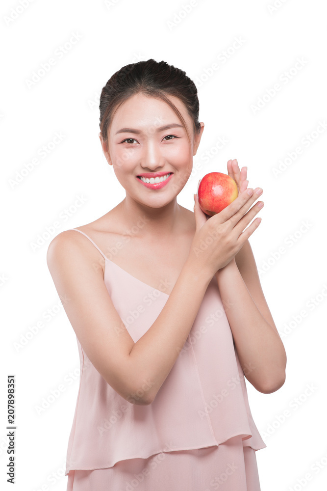 Smiling woman with healthy teeth holding red apple Smiling woman with healthy teeth holding red apple