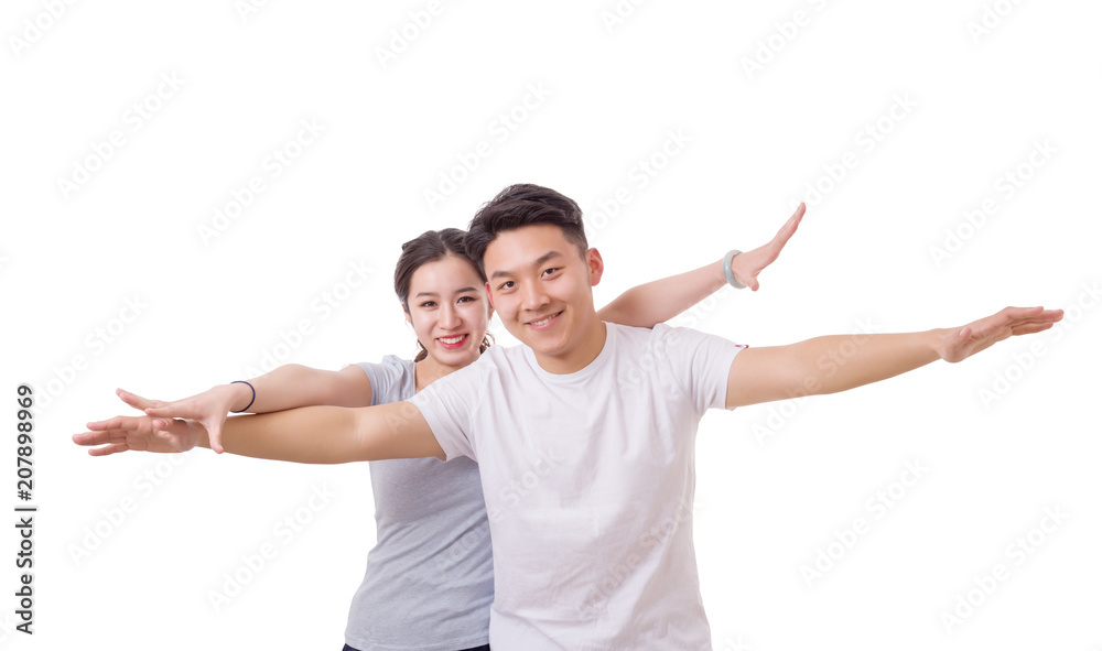 Portrait of flying happy beautiful couple with raised hands up Portrait of flying happy beautiful couple with raised hands up