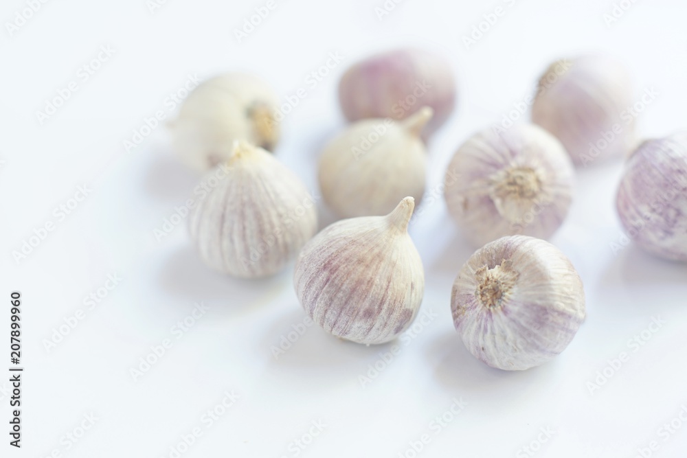 Fresh garlic on white background, copy space Fresh garlic on white background, copy space