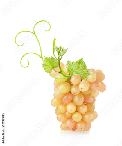 Ripe grapes with leaves isolated on white