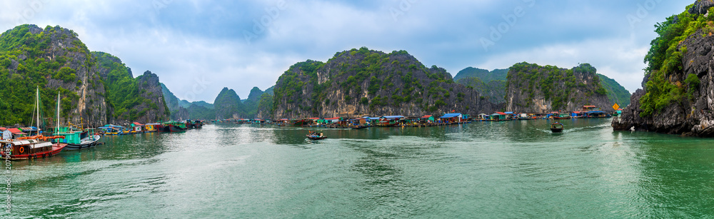 Panorama of LAN HA Bay destination beach and Island with touring floating fishing village the UNESCO World Heritage Site