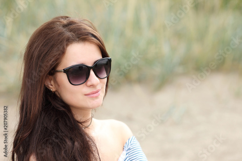 girl on the beach in a dress