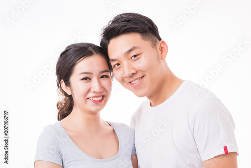  Asian couple looking at camera, happy couple.