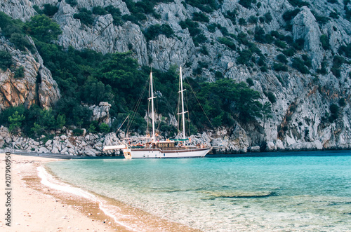 Secluded bay with sailing yacht in the Mediterranean Sea, Turkey