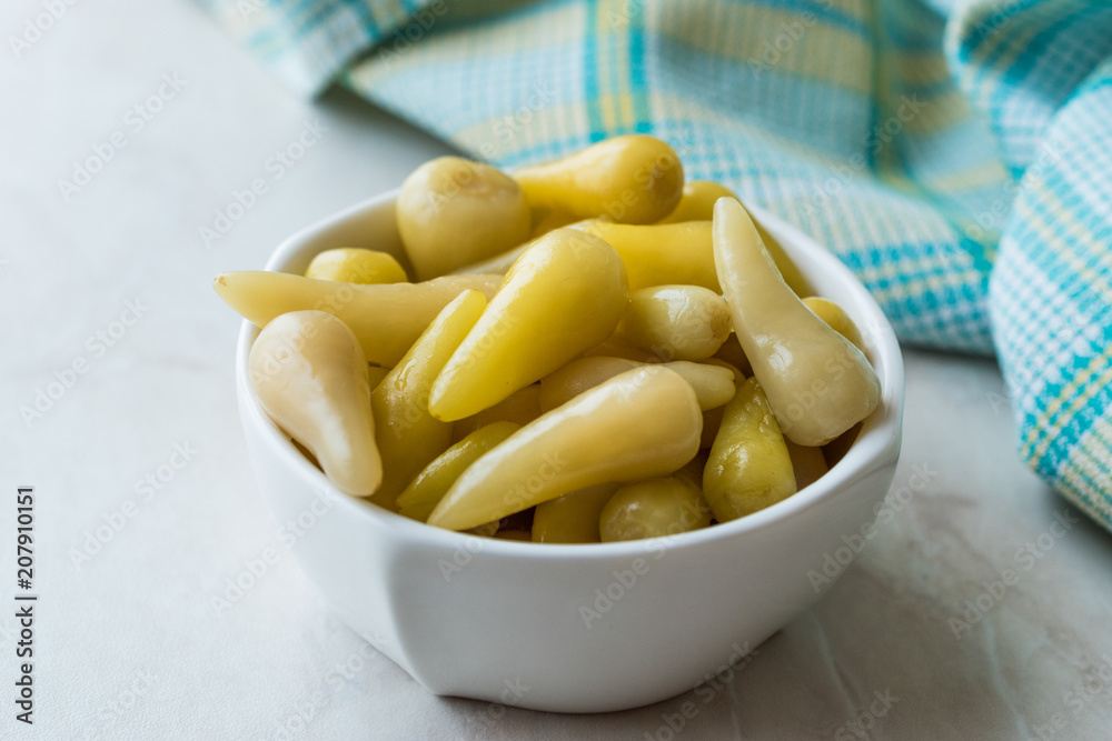 Pickled Green Pepper Pickles in Bowls. Pickled Green Pepper Pickles in Bowls.