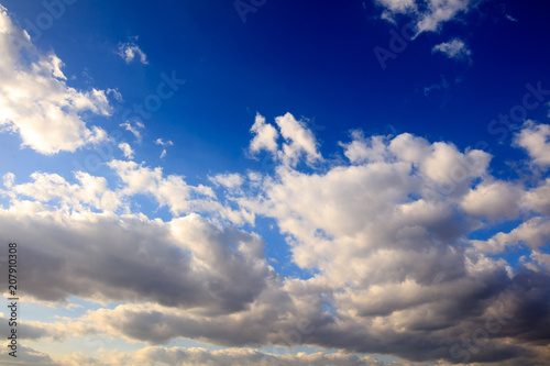 Clouds on a blue sky as a background