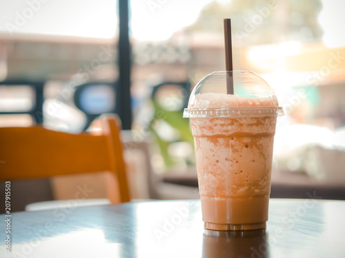 Caramel Macchiato freppe at coffee shop. photo