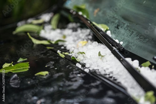 Large hail ice balls on car hood