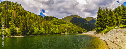 Landscape with a beautiful lake in Parang mountains, Romania photo