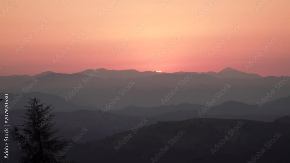 Red sunset on the top of mountains, the end of the day, travel, hiking concept Red sunset on the top of mountains, the end of the day, travel, hiking concept