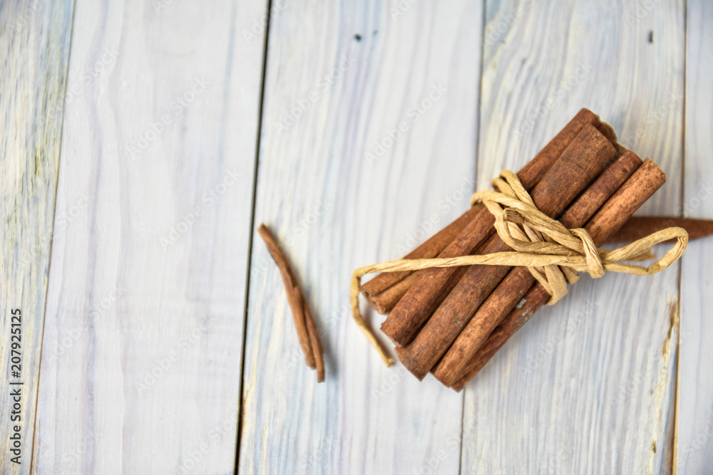 Cinnamon sticks on wooden table. Art soft focus. Cinnamon sticks on wooden table. Art soft focus.