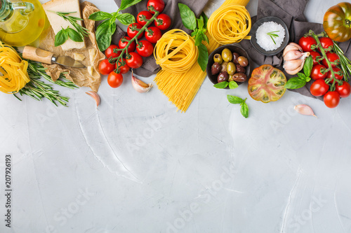 Fototapeta Naklejka Na Ścianę i Meble -  Italian food ingredients with pasta, tomatoes, cheese, olive oil, basil