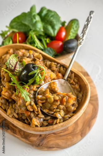 Turkish traditional Lentil salad and a slice of cucumber and green ezogelin, tarhuna. The view from the top photo