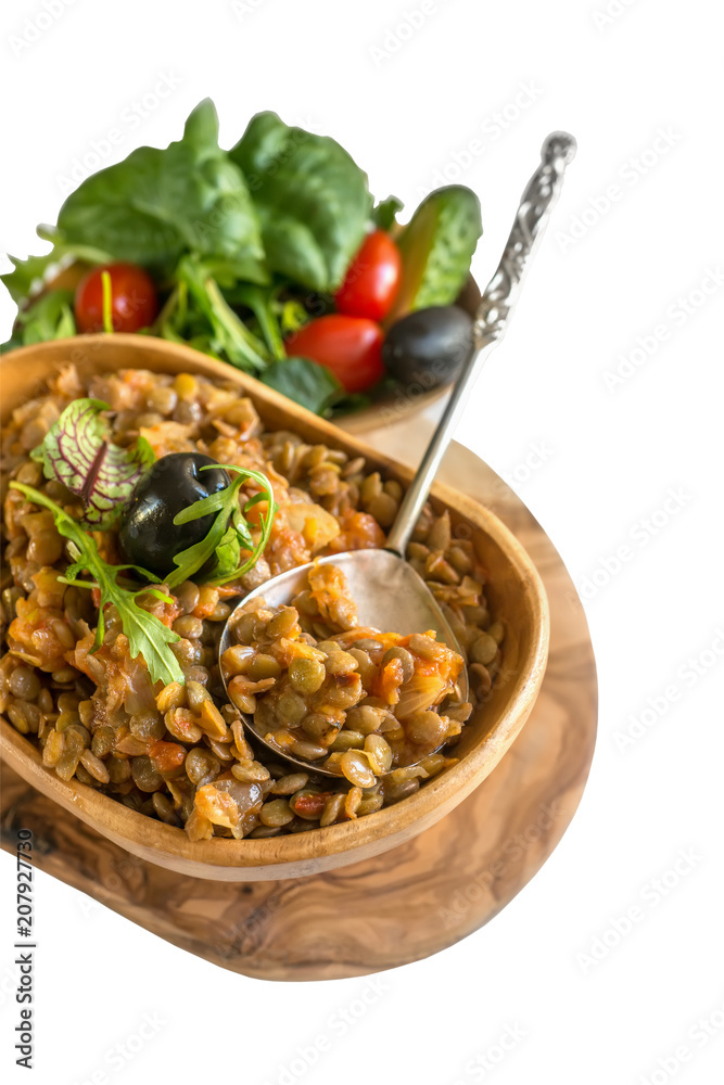 Turkish traditional Lentil salad and a slice of cucumber and green ezogelin, tarhuna. The view from the top. Isolated