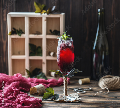 Fresh currant cocktail. Fresh summer cocktail with currant and ice cubes. photo